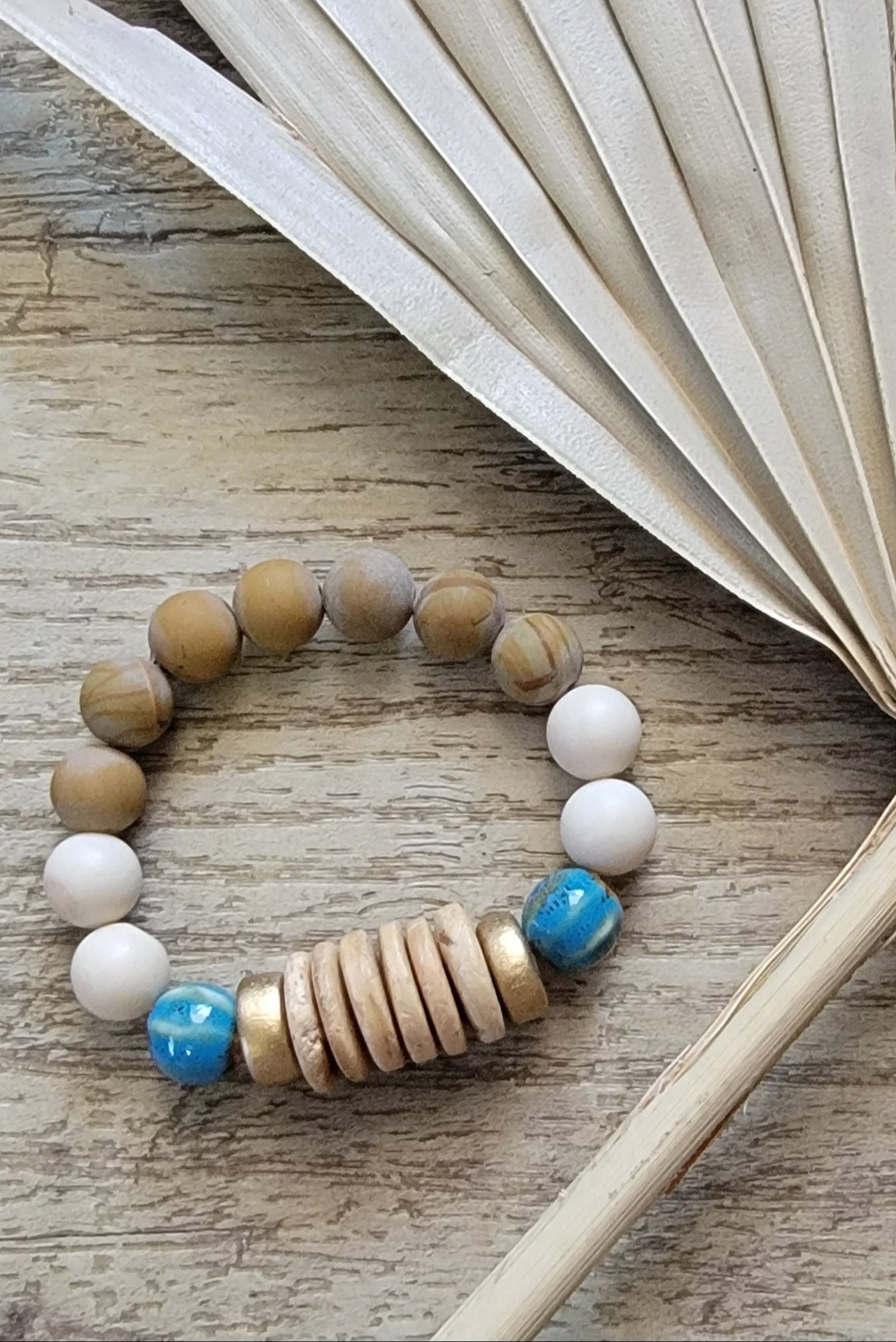 Coconut Disk Aqua Blue Bead Bracelet