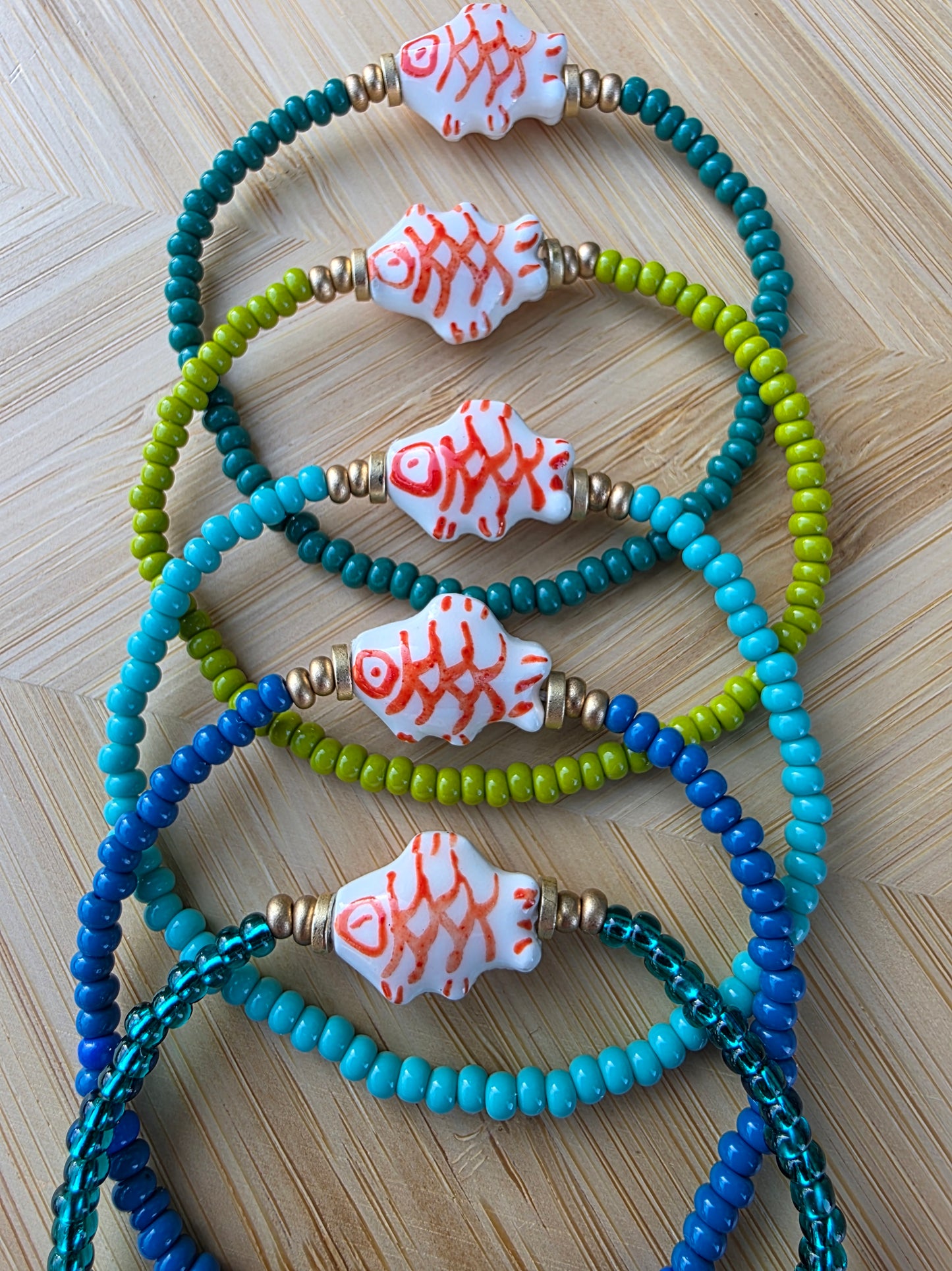 Hand Painted Orange Fish Bead Bracelet