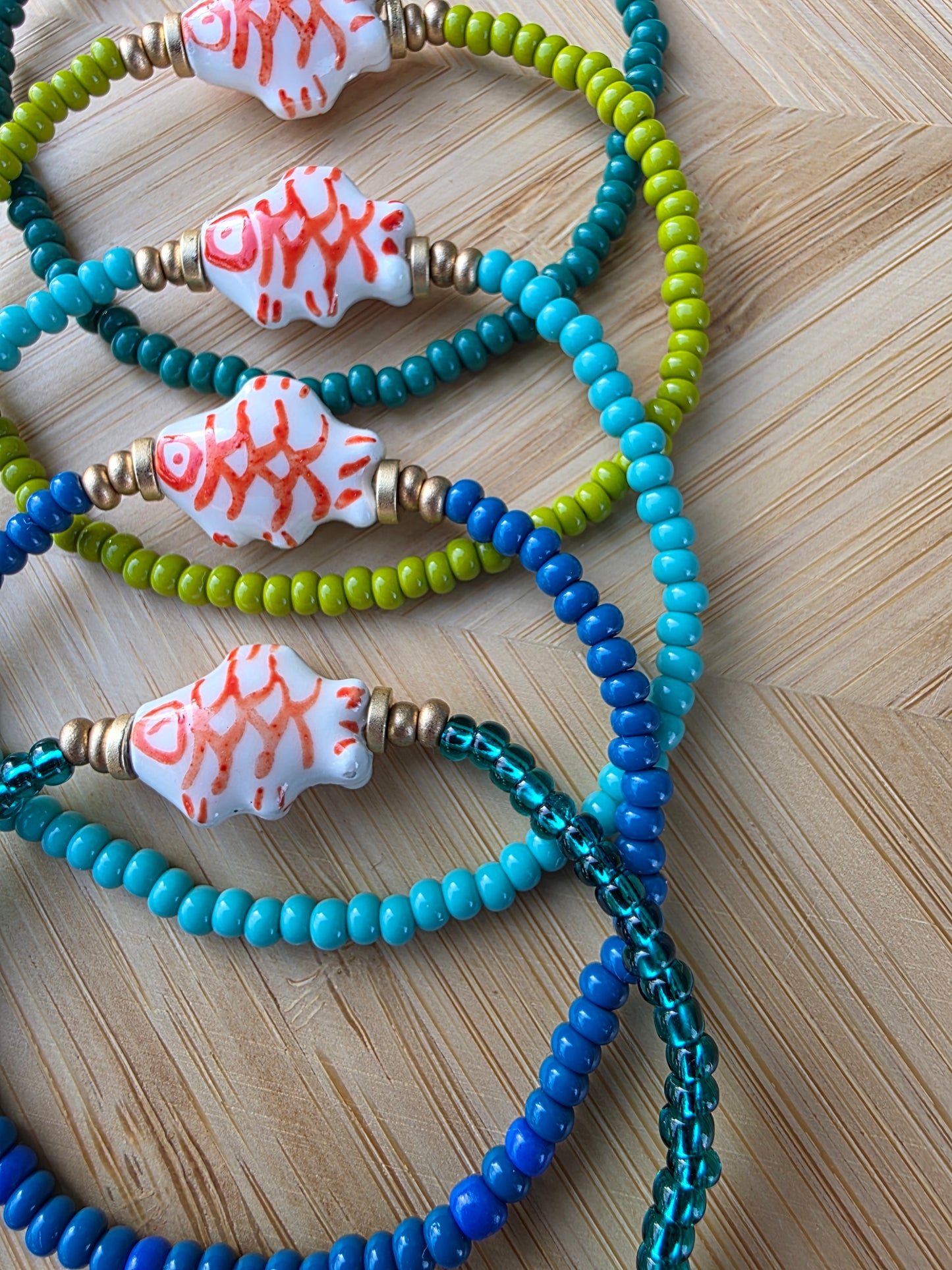 Hand Painted Orange Fish Bead Bracelet
