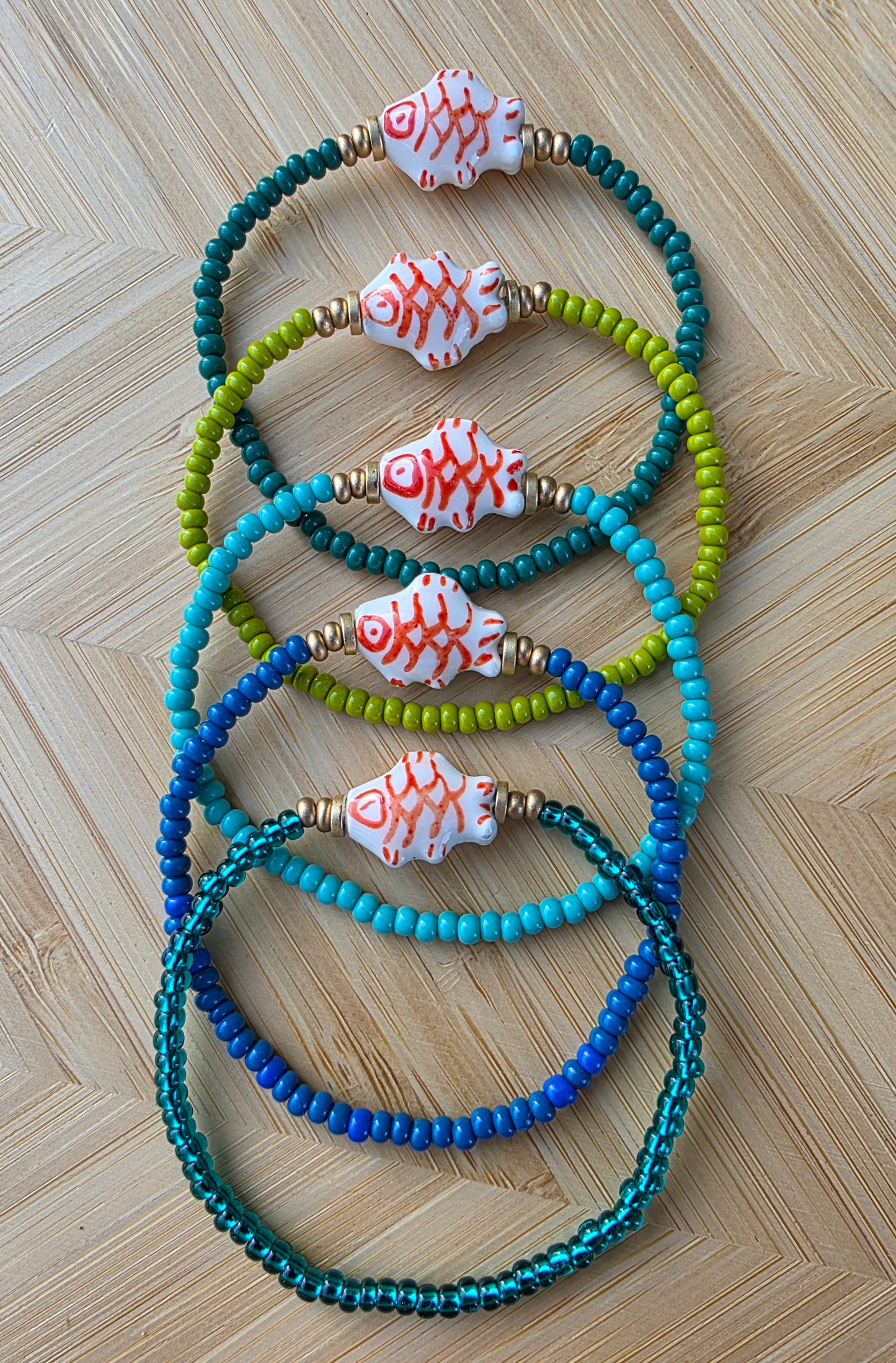 Hand Painted Orange Fish Bead Bracelet